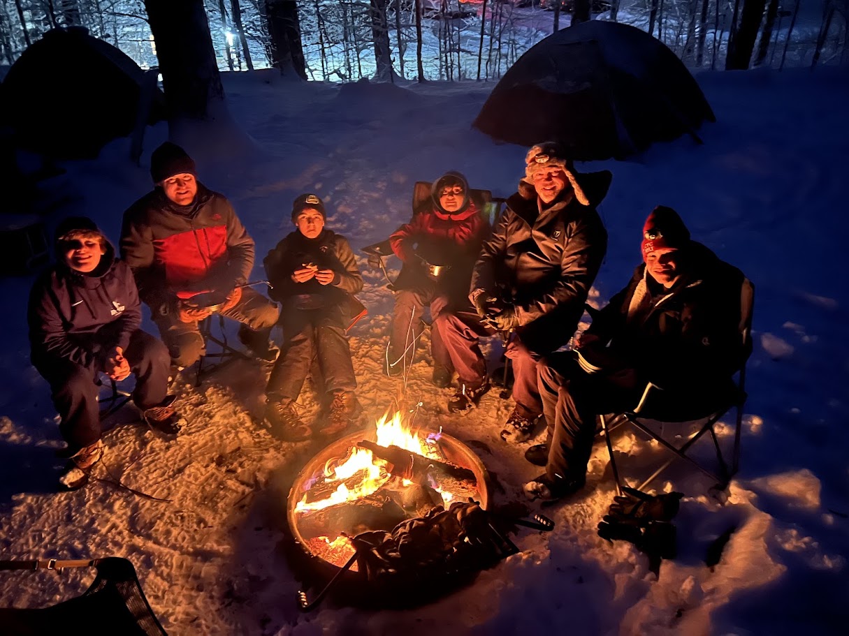 Scouts gathered around a campfire during the Mount Monadnock trip.